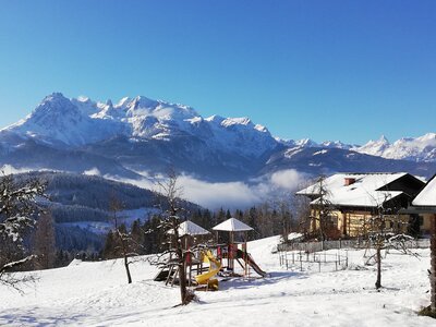 Steinerhof mit Bergpanorama im Winter | © Steinerhof Steinerhof vor Bergpanorama im Winter | © Steinerhof
